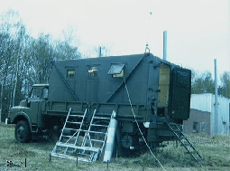 \includegraphics[width=5.4cm]{psfiles/Meerdaal_truck.ps}